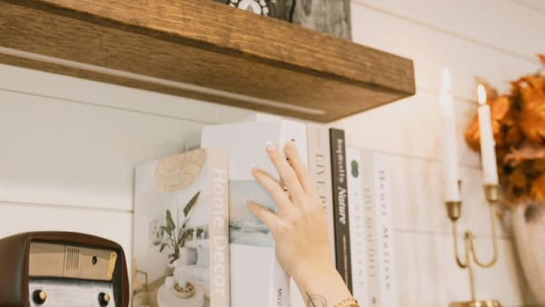 How Do Floating Wood Shelves with Lights Elevate a Drawing Room?